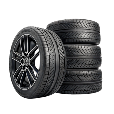 A set of four tires, one of them mounted on an alloy wheel